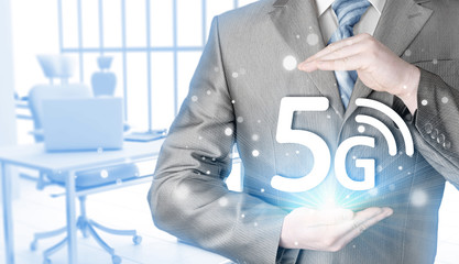 businessman holding in hand 5G, technology background