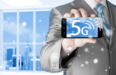 businessman holding in hand 5G, technology background