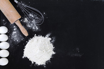 Ingredients for the dough on a black background - 82423663