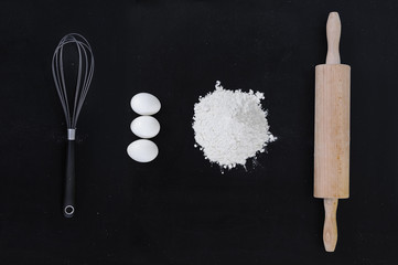 Ingredients for the dough on a black background - 82423669