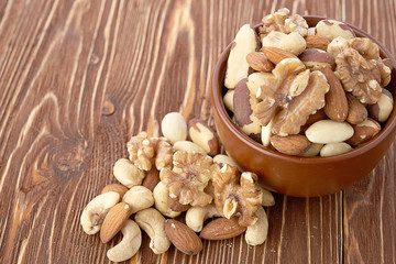 Mix nuts  on wooden background