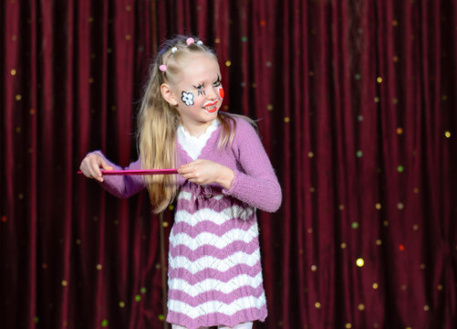 Smiling Little Blond Girl Wearing Pantomime Makeup