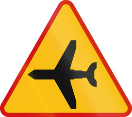 Polish sign warning about air traffic over the road