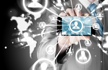 Business Hand holding a phone show the social network