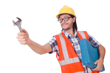 Funny young construction worker with toolbox and wrench isolated