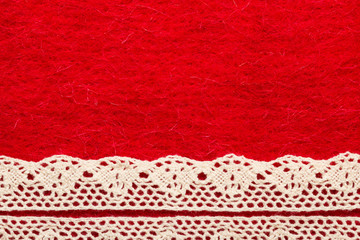 Vintage white lace over red background