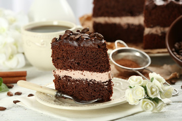 Delicious chocolate cake on table on light background