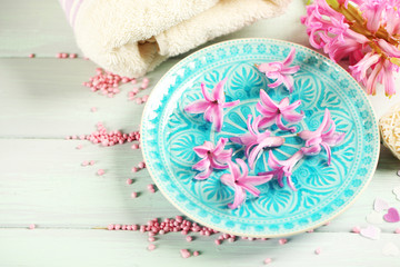 Beautiful spa composition with hyacinth flowers, close up
