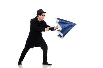 Young man with umbrella isolated on white