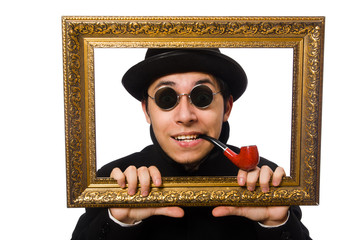 Young man holding frame isolated on white