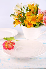 Table setting with flowers, closeup