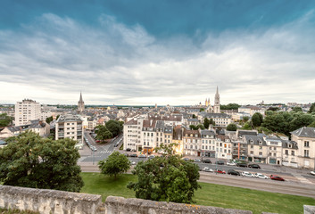 Fototapeta na wymiar Caen, France. Aerial cityscape at dusk