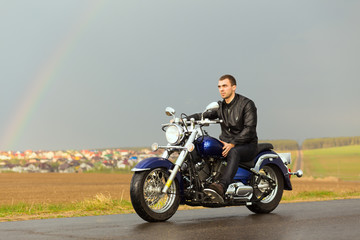 Fototapeta na wymiar Man riding a motorcycle