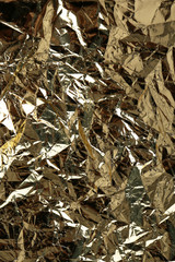 Crumpled color foil texture background