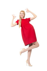 Pretty pregnant woman in red dress isolated on white