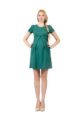 Beautiful pregnant woman in green dress isolated on white