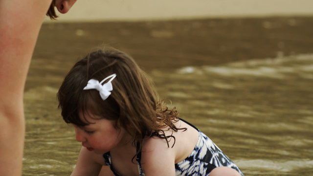little girl at the beach 