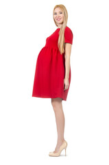 Pretty pregnant woman in red dress isolated on white