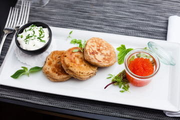 Pancakes with caviar