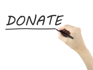 donate word written by man's hand