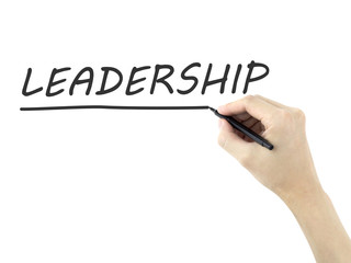 leadership word written by man's hand