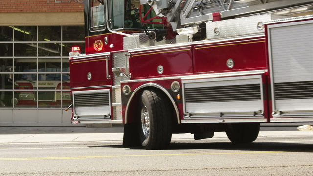 MS Fire engine leaving garage, Pleasant Grove, Utah, USA