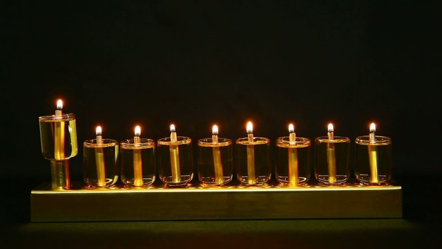 Lit at once -Hanukia made of olive oil lanterns