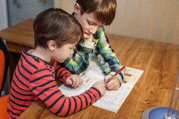 Little boys doing math homework