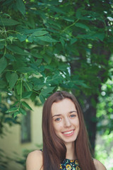 Fototapeta premium Young beautiful teen girl in summer park