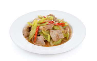 Spicy fried pork with chilli on white plate