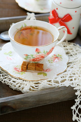 old porcelain cup with tea