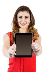 Fototapeta premium Pretty brunette showing tablet pc