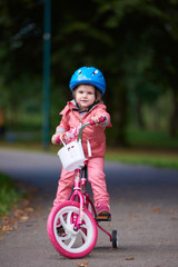 little girl with bicycle