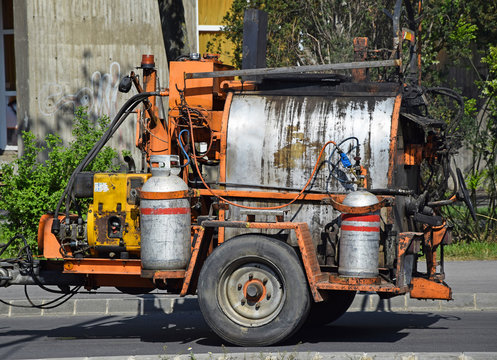 Gas burner machinery at the road construction