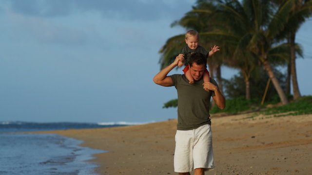 father and son on the beach