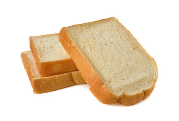 stack of sliced American white bread on white background