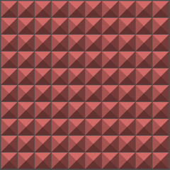 wall with pink orange pyramid tiles pattern