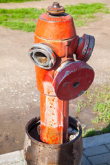 Red fire hydrant, close up vertical photo