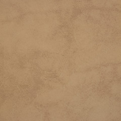 Fototapeta na wymiar Brown leather texture closeup background.