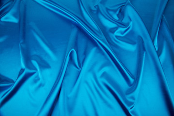 Blue silk drapery.