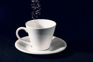 Sifting the blank white sugar cup