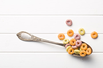 colorful cereal rings in spoon