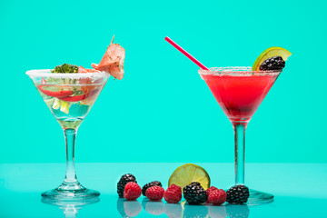Very different cocktails, fruit and meat with vegetables