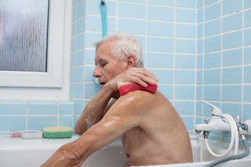 Senior man bathing