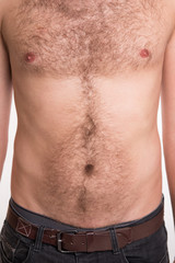 Naklejka premium The man with hair on the chest and abdomen