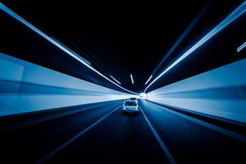 speeding car through tunnel