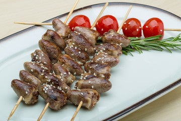 Grilled chicken hearts barbecue