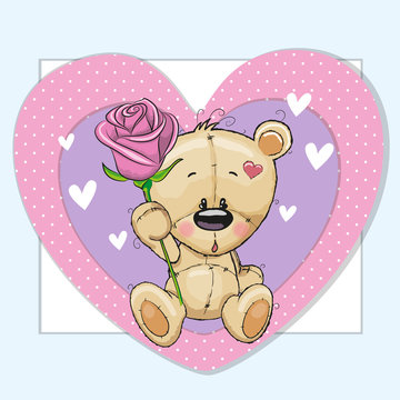 Teddy bear and a flower