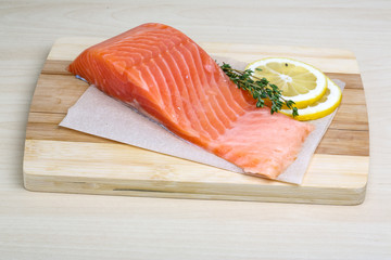 Salted Salmon on the wood background