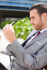 businessman sitting on a bench
